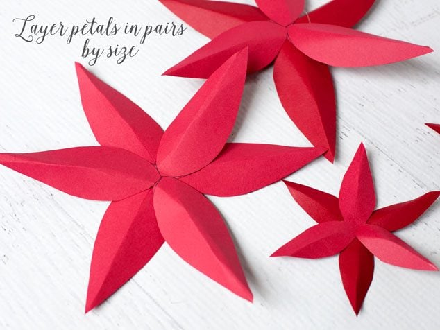 How to make paper poinsettias - layer the petals by size first