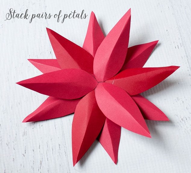 How to make paper poinsettias - you'll need three layers of petals on each petal size